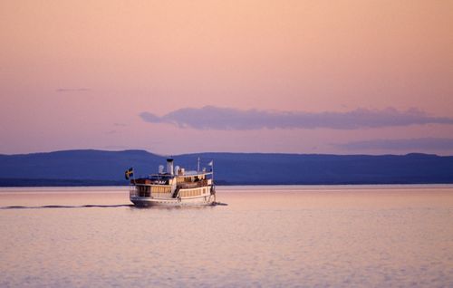 Ferry on Lake Siljan at Sunset