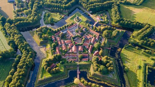 Bourtange Fortress aerial view during sunset in the Province of Groningen. Fortress in shape of star near border of Netherlands and Germany © saleksv/Shutterstock