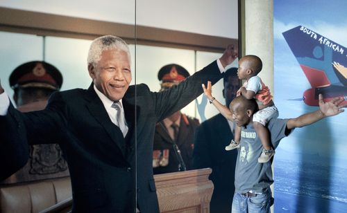 Thami Nkosi, a 29-year old activist, visits the Apartheid museum with his son in Johannesburg, South Africa.
