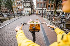 Amsterdam on a bicycle © RossHelen/Shutterstock