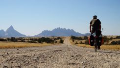 Long distance cycling at Spitzkoppe, Namibia © TravelNerd/Shutterstock