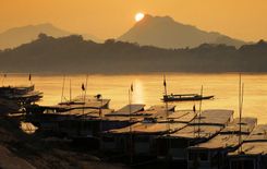 Mekong river, Luang Prabang port in Laos © i viewfinder/Shutterstock